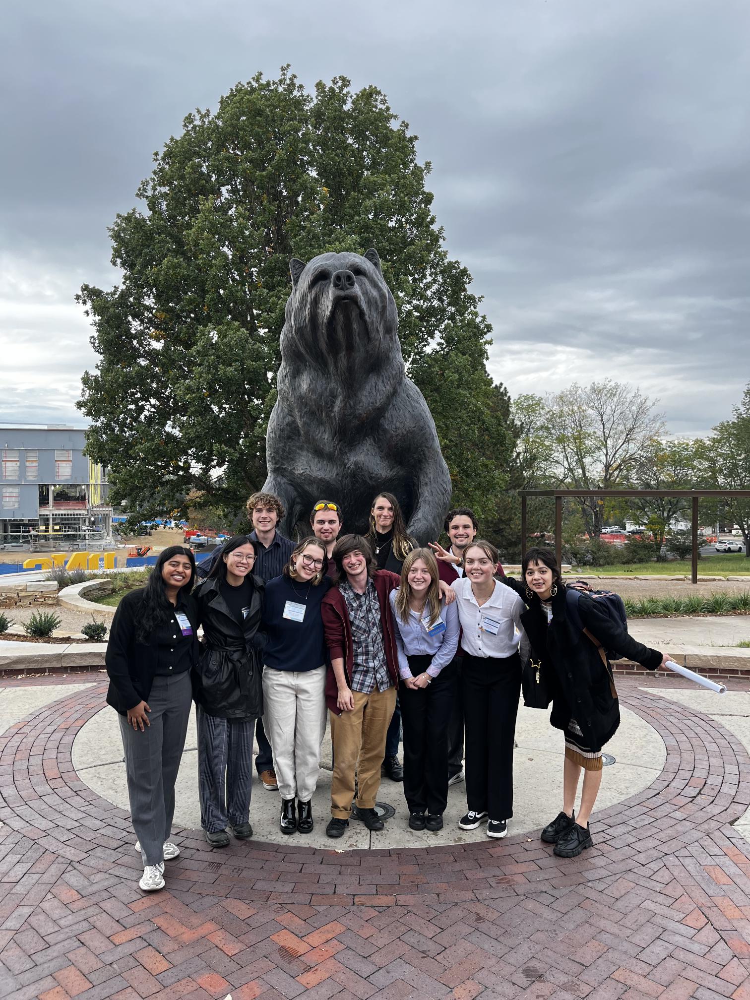 Members of SPS posing with the University of Northern Colorado bear statue after attending the Four Corners Conference